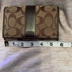 Signature coach wallet